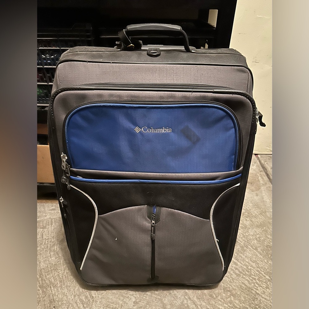 Large Columbia brand suitcase. Lots of room, lightweight